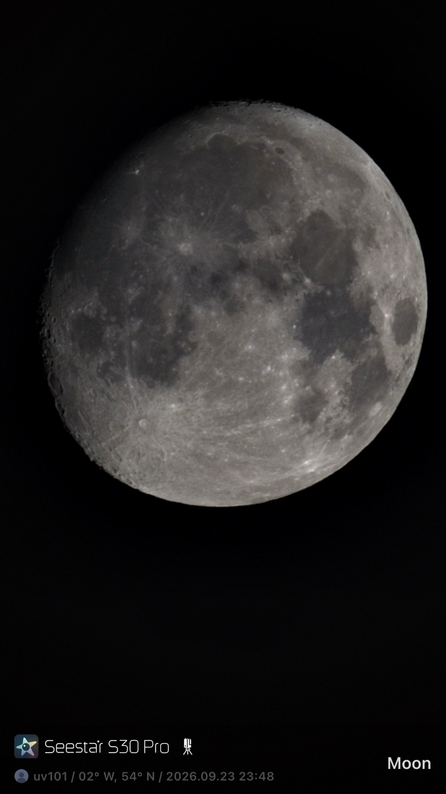 Waxing gibbous Moon filling the frame, with ray craters and the terminator in detail